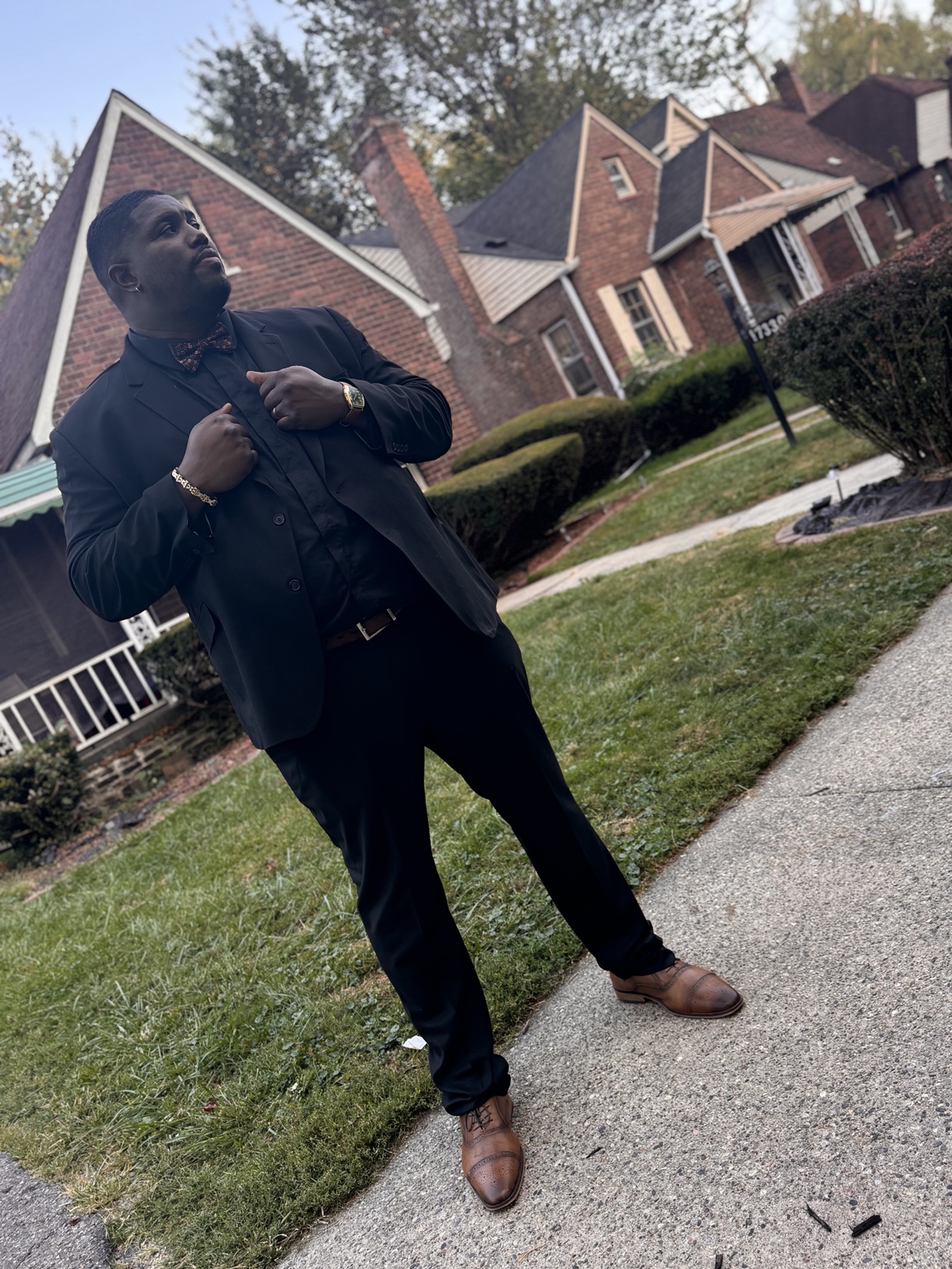 Chris Lanard dressed in a black suit